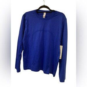 NWT Lululemon swiftly tech relaxed long sleeve DEEP SEA
BLUE Size 6